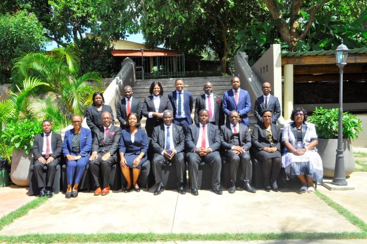 Members of JCE pose for a photograph with Chief Justice Mzikamanda SC (seated middle), officials from Electoral Commission and facilitators of the Induction