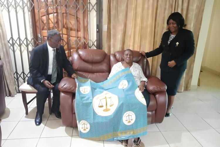 Retired Chief Justice Msosa (in the middle) flanked by Chief Justice Mzikamanda, SC (left) and the Chief Courts Administrator, Mrs. Chikagwa (right)