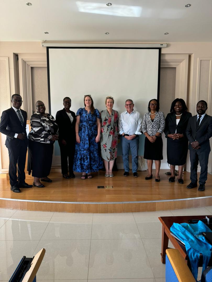 Facilitators and the Training Officer, Charles Kaolowa (L)