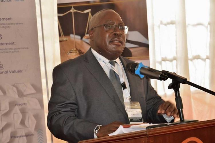 Supreme Court Justice Frank Kapanda, SC making his presentation 